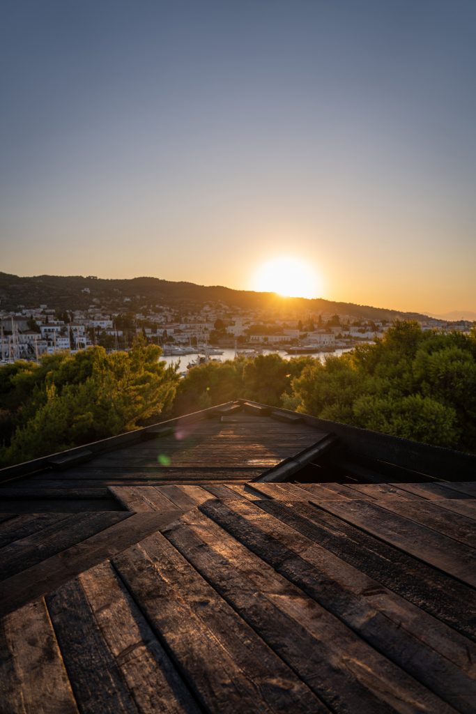 View of the Spetses harbour and coast from the roof at sunset
