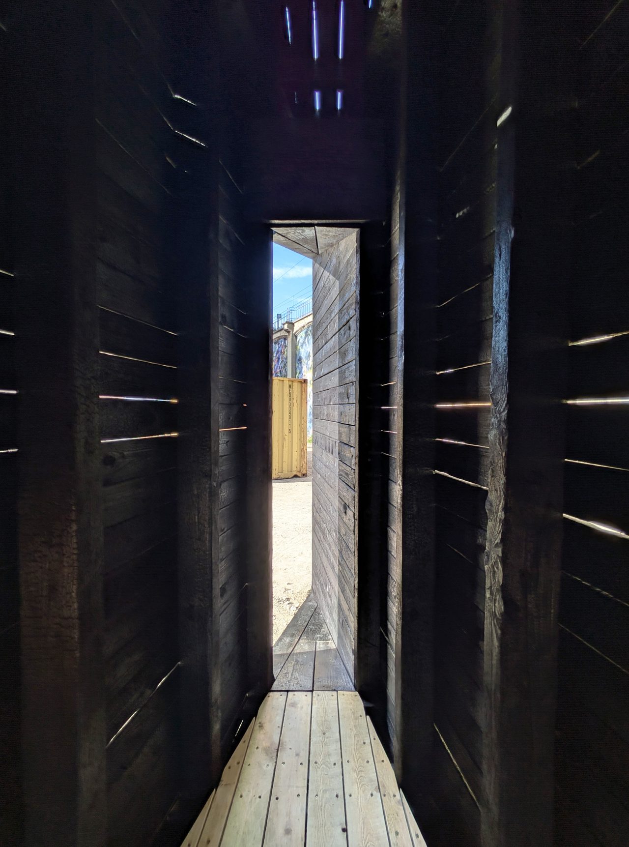 The narrow sideways entrance, seen from inside the chapel