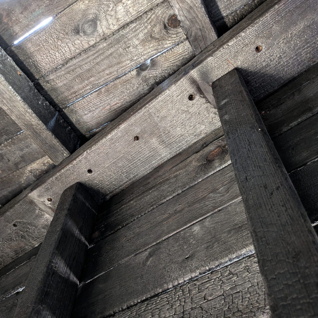 Holes in the ceiling beams for suspending gongs and other meditative aids