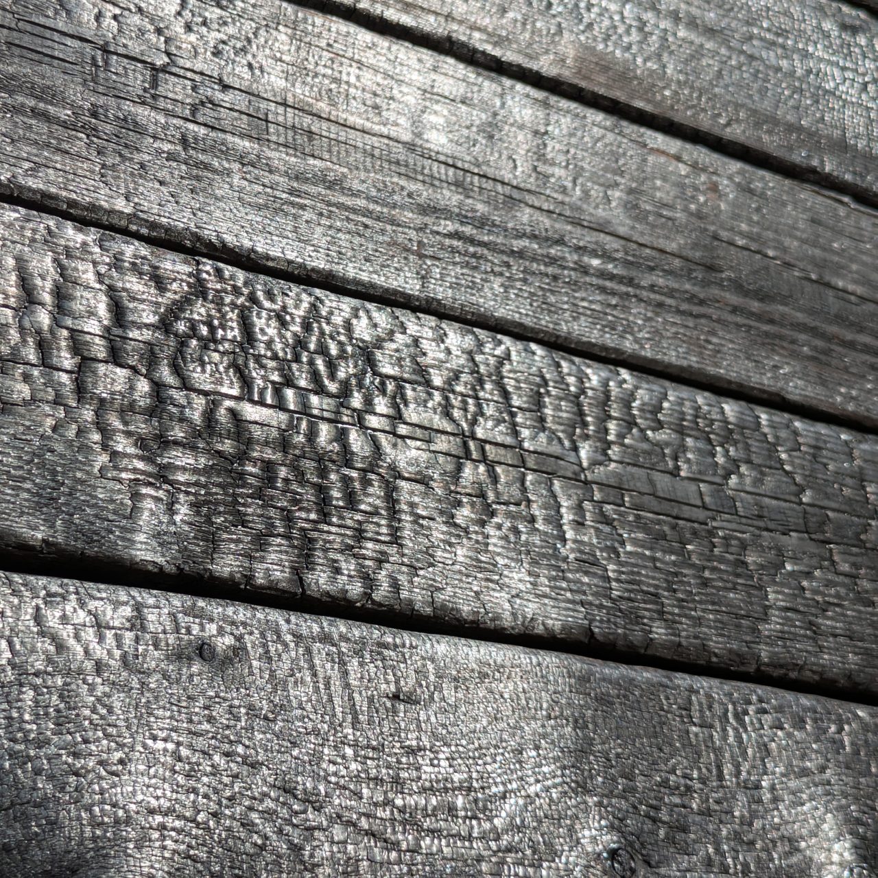 Close-up of the blowtorch-charred timber cladding