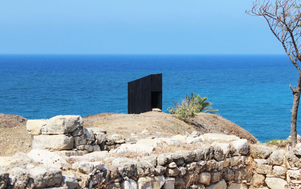 The slender timber chapel seen on the approach within Byblos Castle