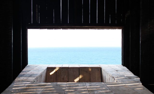 Sliding Chapel, a slender timber chapel within the walls of Byblos Castle, Lebanon