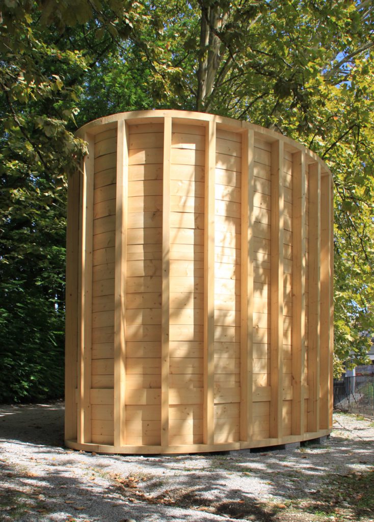Curved edge of the bent-timber wall