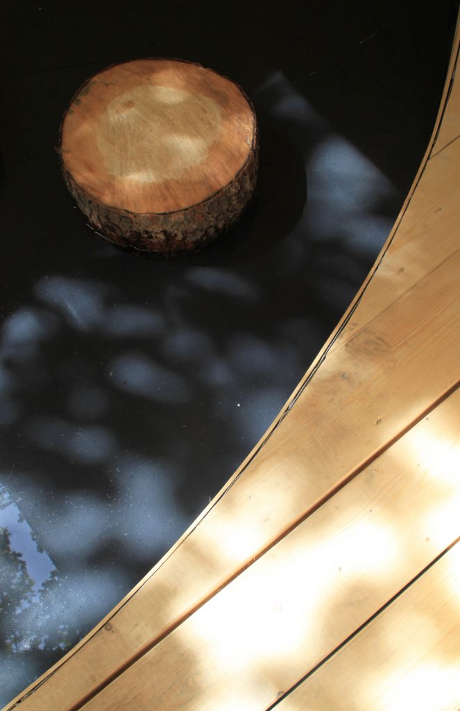 Junction between the timber floor and the pool