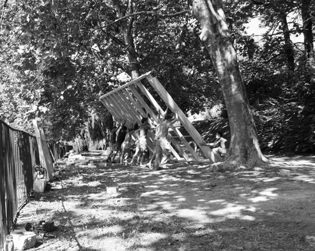 Raising the timber frames during construction